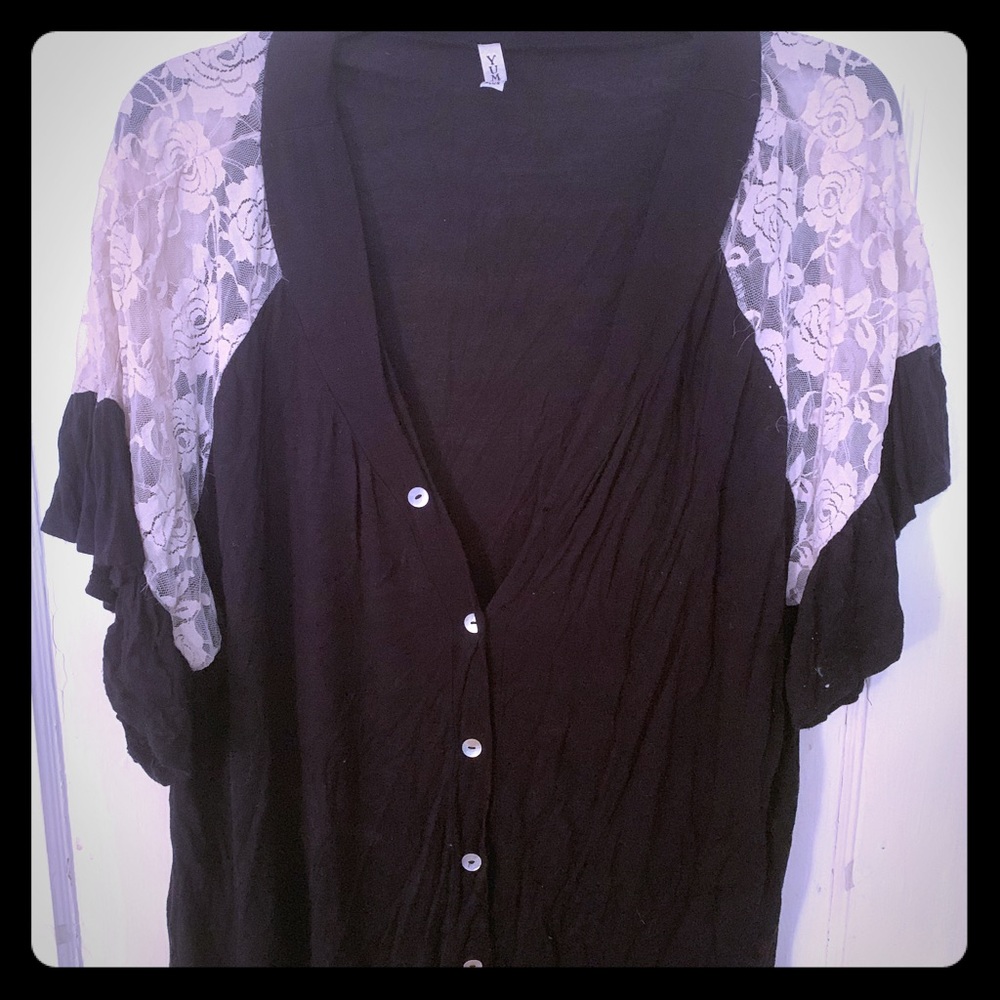 Black shirt with lace detail.